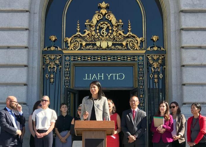 Breanna speaks at a city hall press conference