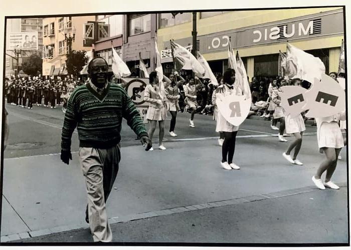  family member marching in a parade